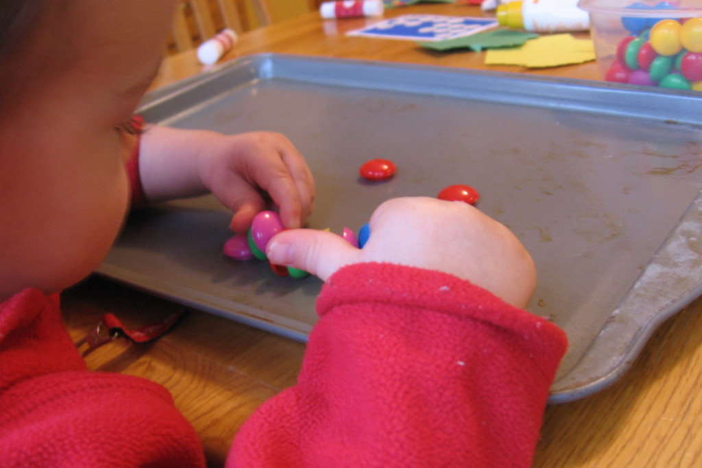 child playing with magnets